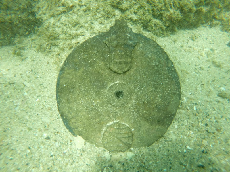 The astrolabe still underwater at the site.